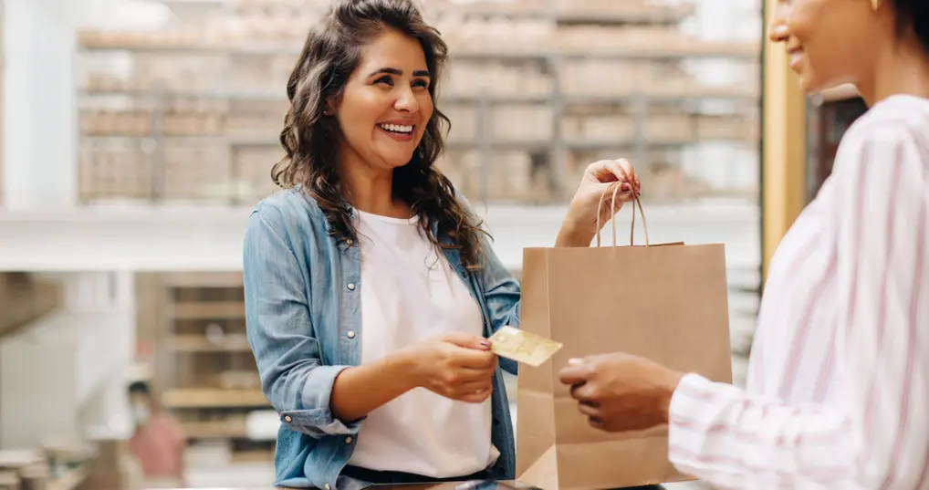 happy_woman_shops_with_credit_card
